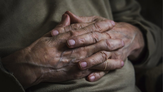 Hands of an elderly man