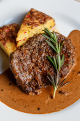 steak on a plate with spices
