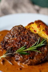 steak on a plate with spices