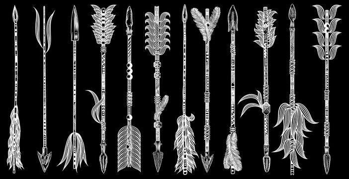 Set of ethnic Boho arrows with feathers. Decorative tribal hand drawn arrows collection with different tips and plumage. Native American style set. Vector.