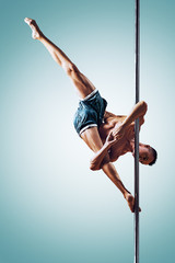 Man pole dancing