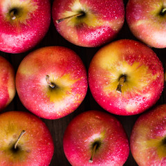 red apples on a wooden table