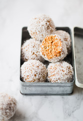 Carrot Coconut sweet balls, selective focus