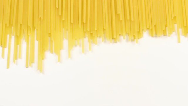 Pasta on white background close up macro.