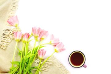 Lap blanket, cup of tea and flower bouquet, copyspace, flatlay