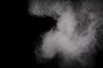 White powder. Grainy abstract texture on black background.