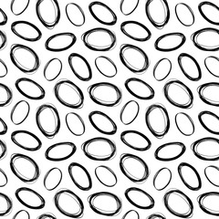 Seamless decorative pattern with hand drawn oval shapes.