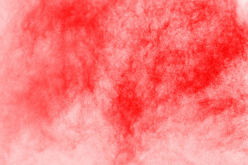 Red powder explosion on white background. Colored cloud. Colorful dust explode. Paint Holi.