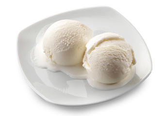 two ice cream scoops on plate isolated on white background