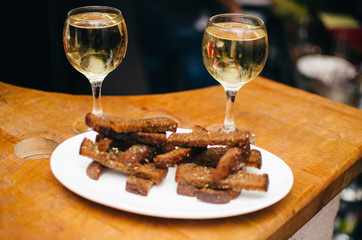 in the club for an alcoholic party is two glasses with a light vein