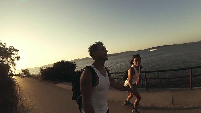 A couple on rollerblades