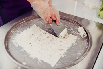 Ice cream roll. Thailand stir-fried ice cream rolls at freeze pan