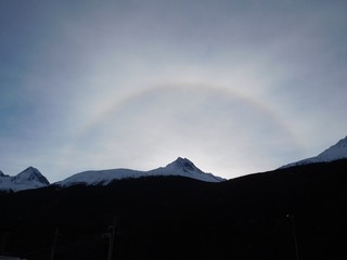 A halo is seen around the rising sun in Southeast Alaska.