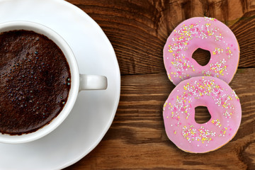 Extremely tasty sweet donut together with aromatic coffee full of caffeine is an unforgettable taste and relaxation experience after every effort, both mental and physical.
