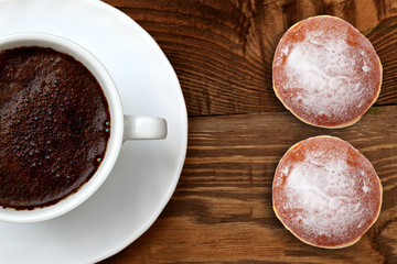 Extremely tasty sweet donut together with aromatic coffee full of caffeine is an unforgettable taste and relaxation experience after every effort, both mental and physical.
