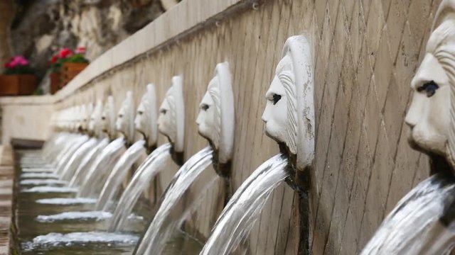 lion fountain greek statue waterfall