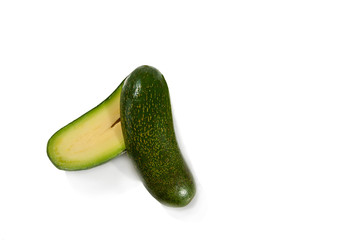 Fresh seedless cocktail avocado isolated on white background. Cucumber avocado. Marks and Spencer new genetic gift for avocado fans.