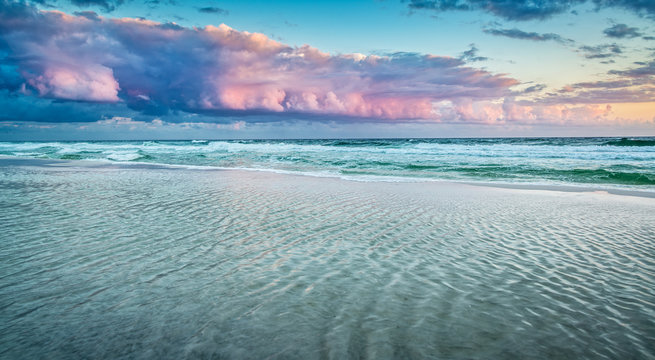 Pink clouds over the ocean