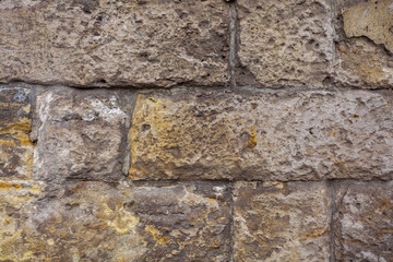 Stone wall background Wall made of cavern rock