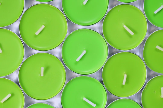 Green candle, several gathered regularly