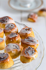 Poppy seed cakes. Mini rolls with poppy seed and icing sugar.