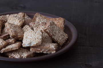 Sweet biscuits with sesame seeds on a plate