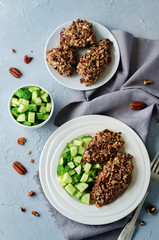 Pecan crust chicken breasts with cucumber's slices