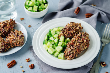 Pecan crust chicken breasts with cucumber's slices