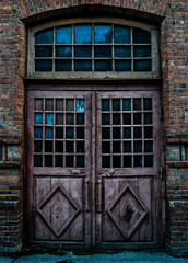Old door on a brick wall