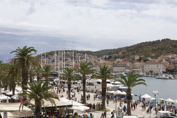 Fototapeta na wymiar TROGIR, CROATIA: City center of the historic town of Trogir in Croazia, with its promenade on the waterfront