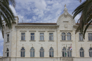 Fototapeta na wymiar Architectural view of the ancient venetian building that host the primary school Peter Berislavic in Trogir, Croatia