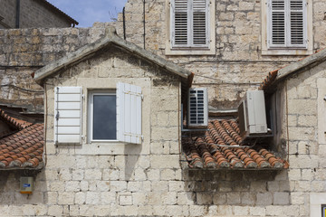 TROGIR, CROATIA: Traditional ancient houses in Trogir city center, Croatia.