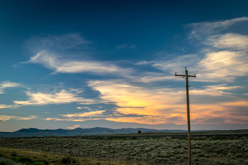 PHONE LINES AND MONTANA SUNSET