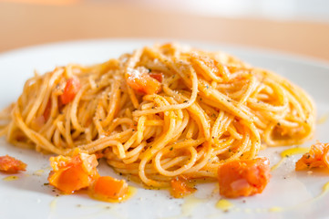 Classic tomato spaghetti with parmesan.