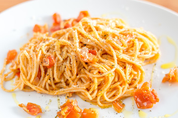 Classic tomato spaghetti with parmesan.