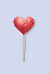 Shiny heart on a wooden stick, Valentine's Day