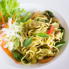 
Pork green Curry Spaghetti.Thai cuisine 
