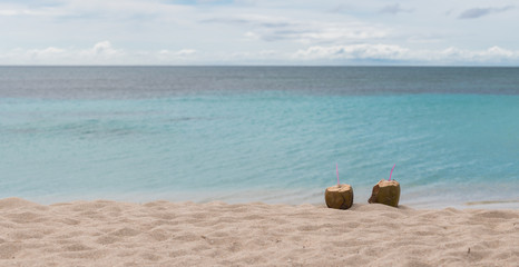 Fototapeta na wymiar Coconut cocktails at the beach