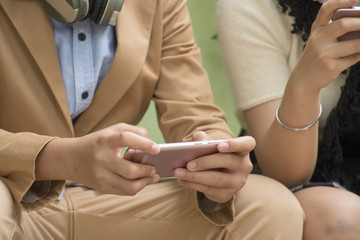 Obraz premium Hand is playing games on mobile phone