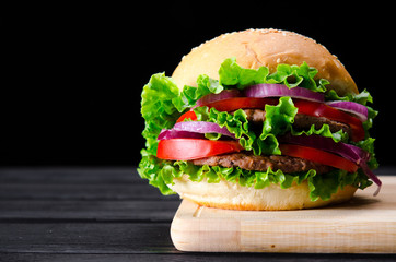 Burger served in bun in nutrition fast food concept