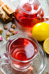 Fruit berry tea in the cup served on table