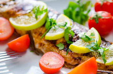 Fried fish served on the plate
