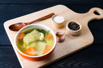 Fish soup served on the table in plate