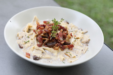 pasta fettuccine alfredo white sauce with ham bacon and mushroom