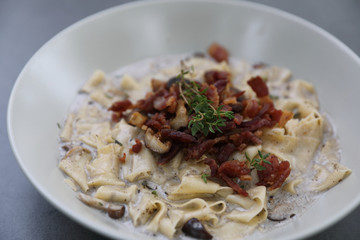 pasta fettuccine alfredo white sauce with ham bacon and mushroom