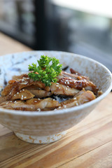 japanese food , Chicken teriyaki with rice on wood background