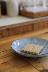 Cookie isolated in wood background