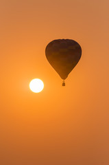 silhouette of balloon with sunset © rtrujira