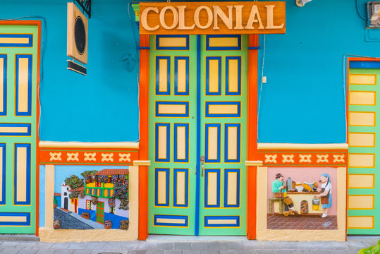 doors and colorful wall decorations colonial houses of the village of Guatape