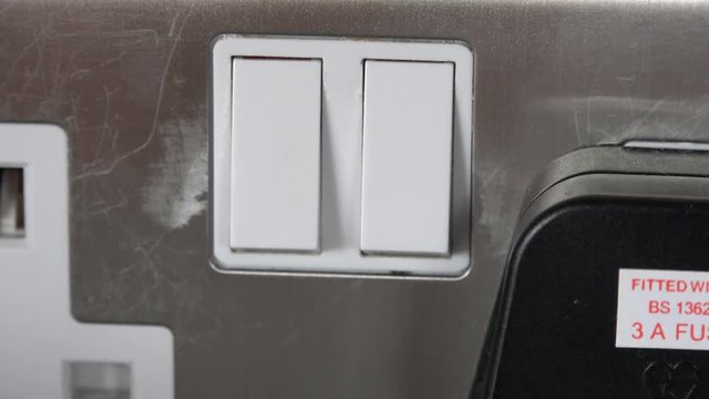 turning power off UK wall plug sockets or outlets 